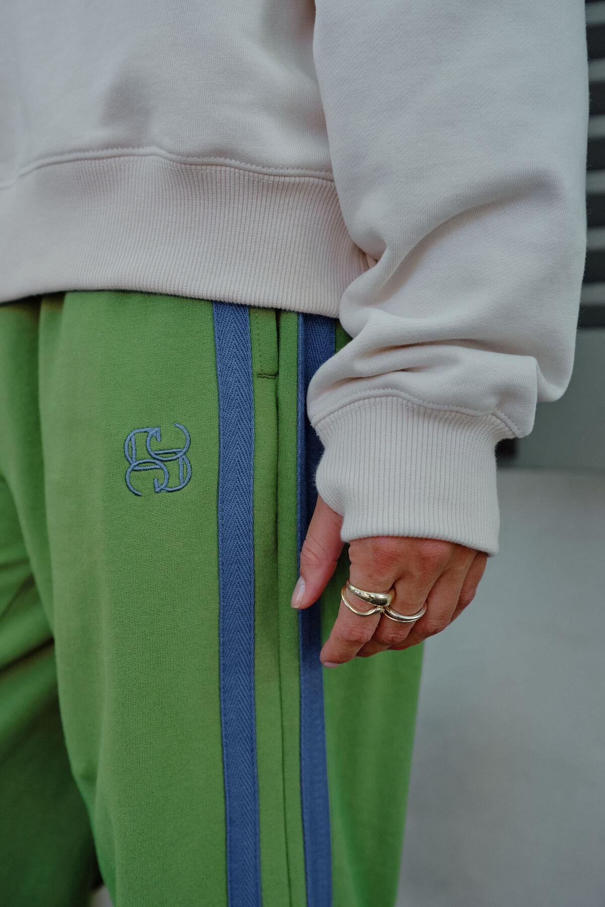 wide leg cotton trackpants pistachio with navy side stripe | Sterling Belle
