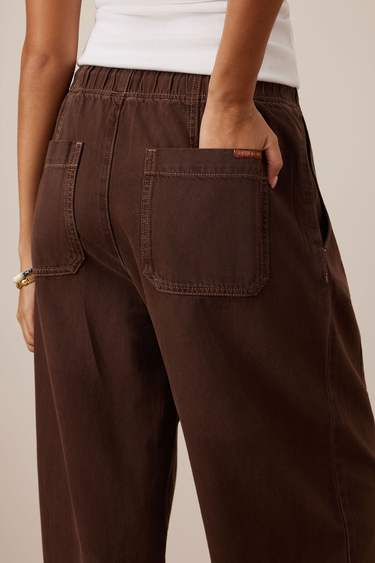 women’s denim barrel leg pants in brown