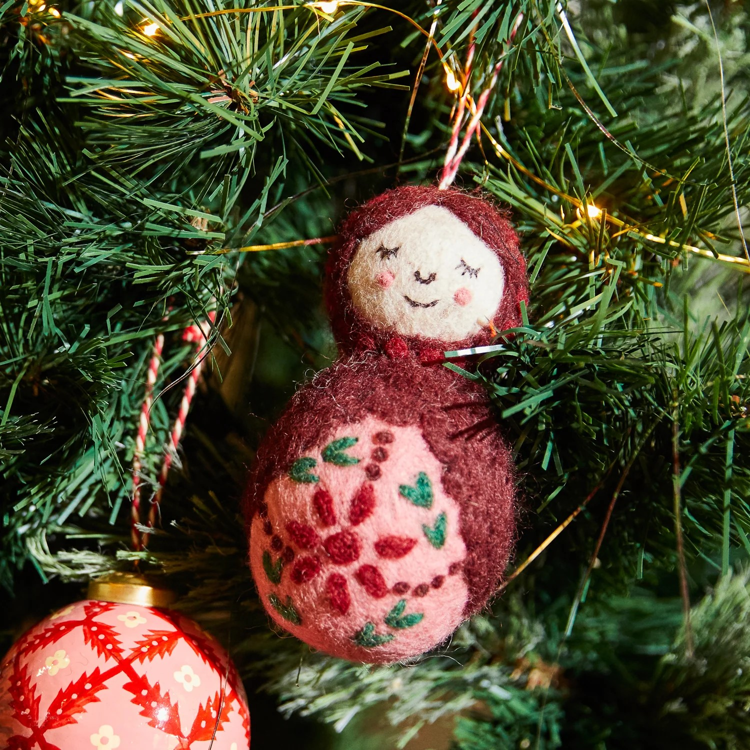 matryoshka doll hanging on a Christmas  tree ornament