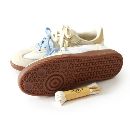 women’s retro‑inspired sneakers in cream pony hair and blue