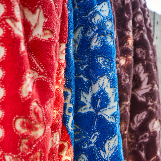 oversized cotton bath towel terry towelling with colourful floral designs
